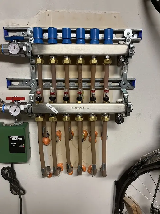 Plumber performing Gas Line Installation at a residential property in Battlefield